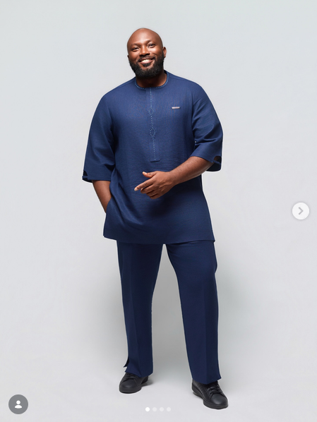 TNH model wearing a deep navy contemporary two-piece set